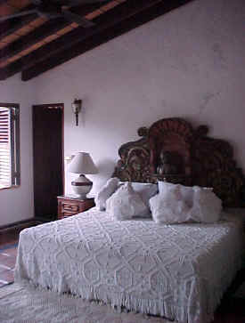 upstairs bedroom with king bed